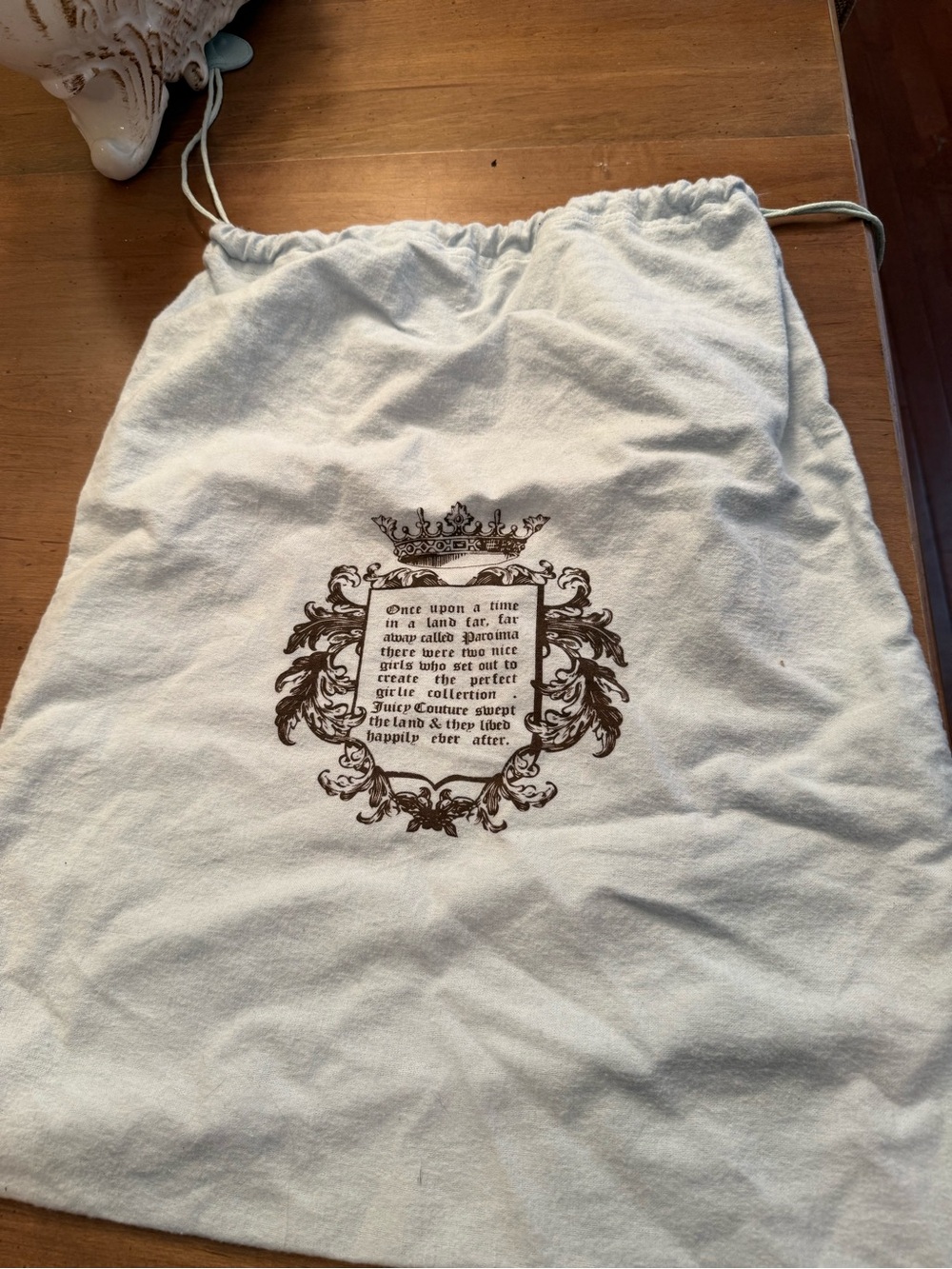 Juicy Couture Drawstring Dust Bag with Ornate Crest Print - Light Blue